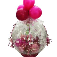 Geschenkballon pink, bourdeaux verpackt in Folie