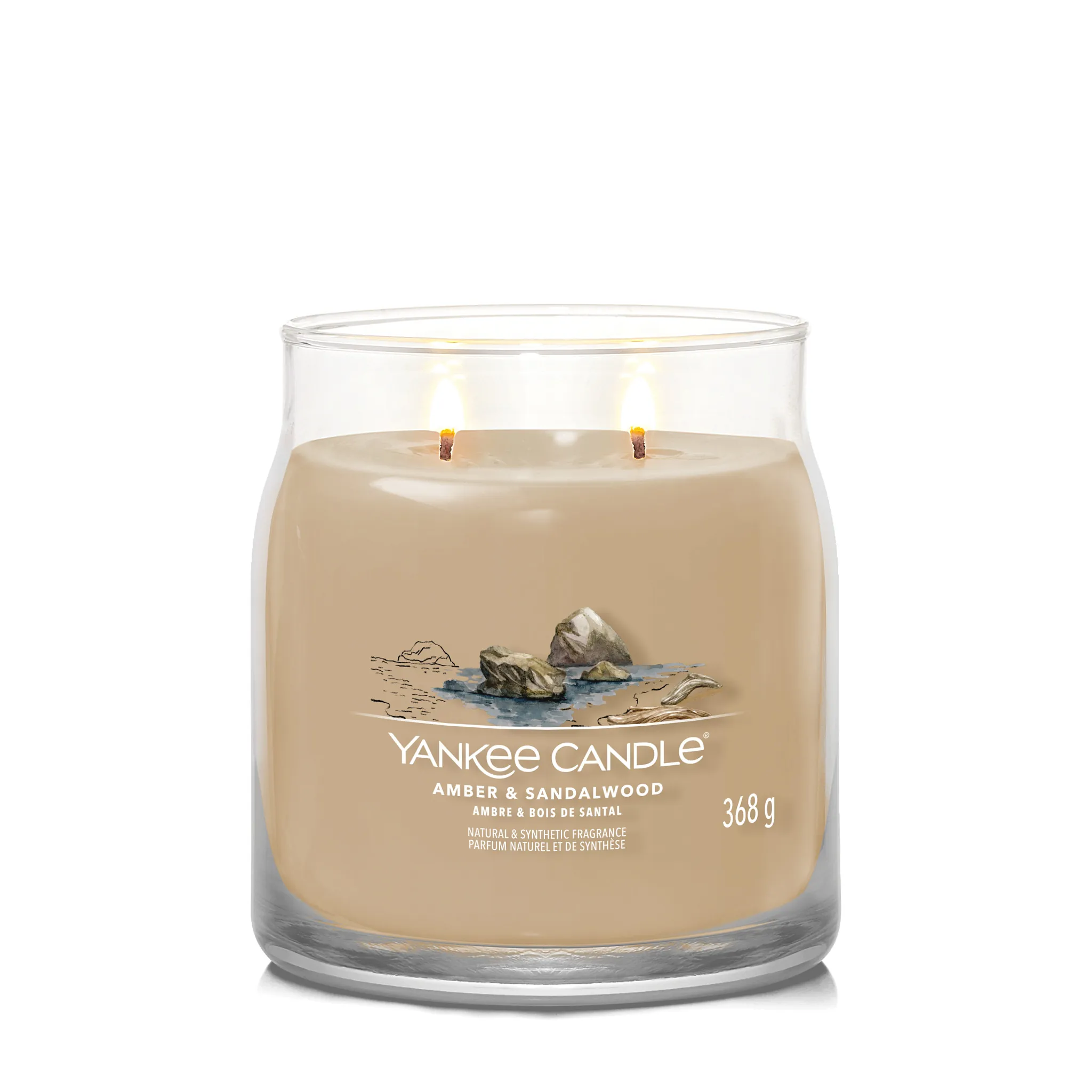Yankee Candle Duftkerze - Amber & Sandalwood, Medium Glas mit brennenden Dochten