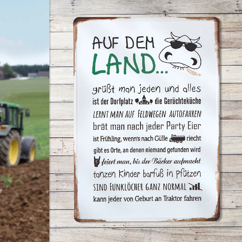 Blechschild "Landleben" mit Spruch und Kuhmotiv, Stimmungsbild